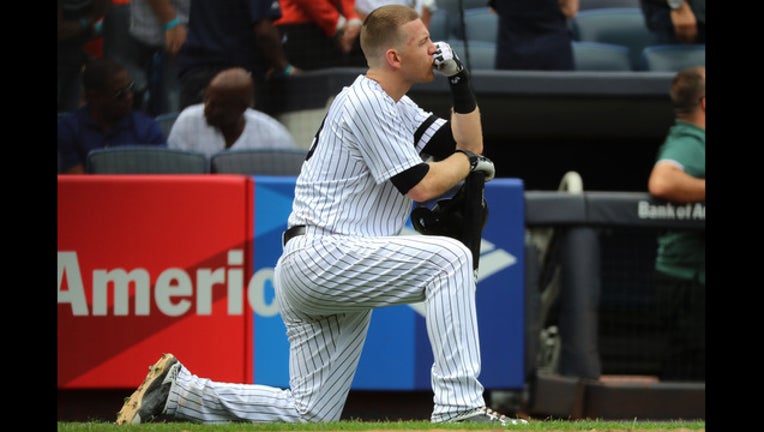 bf87ca3e-Getty_Yankee fan hit by foul ball