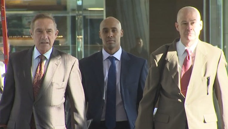 Mohamed Noor walks to court