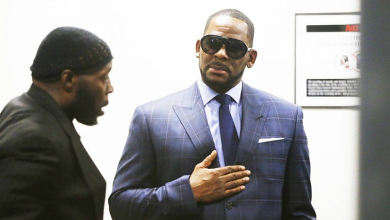 f5b45e92-GETTY r kelly_1551908909472.jpg-404023-404023.jpg