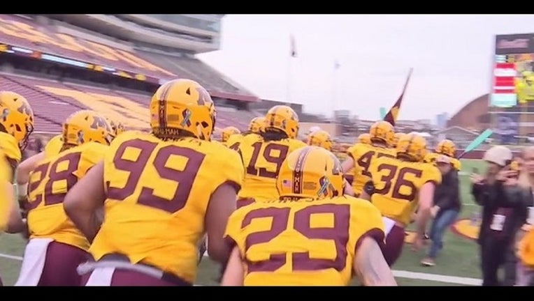 fa7e6f7c-gophers-football-runout_1524676098219.jpg