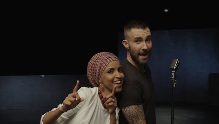 fcae7a44-Ilhan Omar and Adam Levine