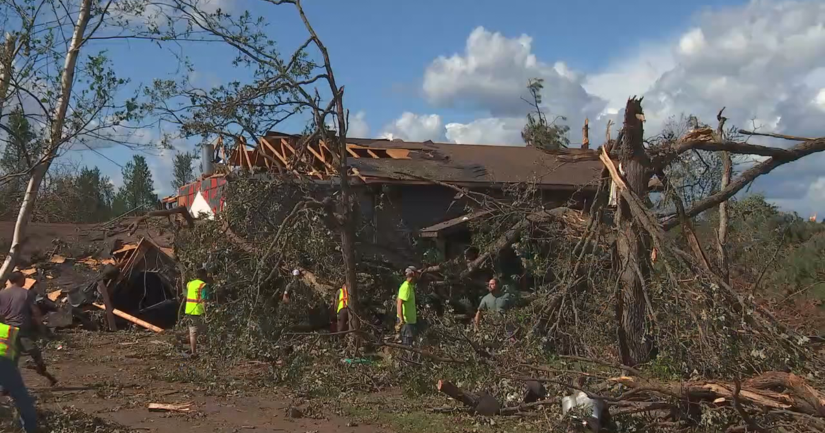 Long Road Ahead: Volunteers clean up after tornado rips through western ...