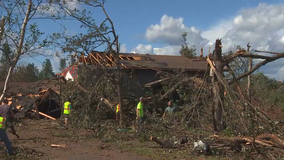 Long Road Ahead: Volunteers clean up after tornado rips through western Wis.