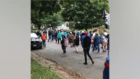 Protesters march in Midway neighborhood after last week's officer-involved shooting in St. Paul, Minn.