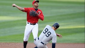 Twins turn triple play, beat Yankees 8-6