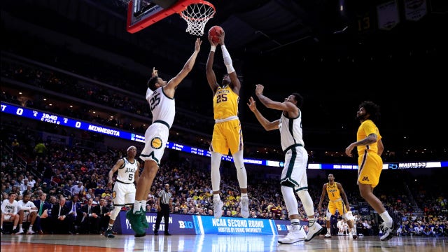 Oturu's career-high 30 points leads Gophers past No. 19 Michigan, 75-67
