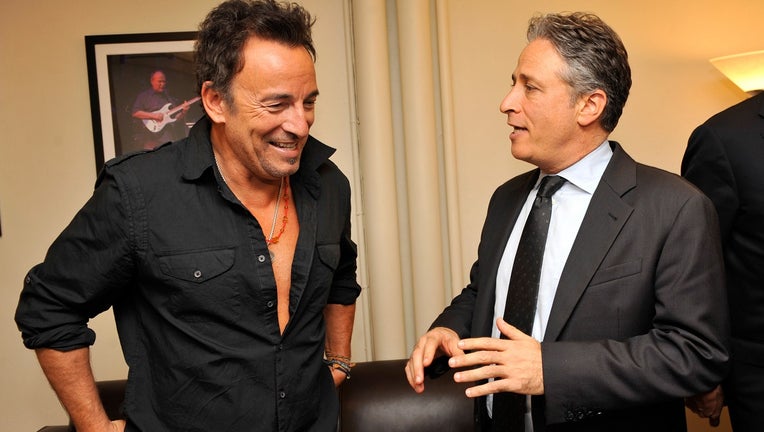 Bruce Springsteen and Jon Stewart backstage at 