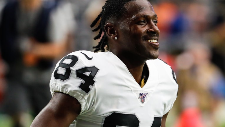GLENDALE, AZ - AUGUST 15: Oakland Raiders wide receiver Antonio Brown (84) smiles before the NFL preseason football game between the Oakland Raiders and the Arizona Cardinals on August 15, 2019 at State Farm Stadium in Glendale, Arizona. (Photo by Kevin Abele/Icon Sportswire via Getty Images)