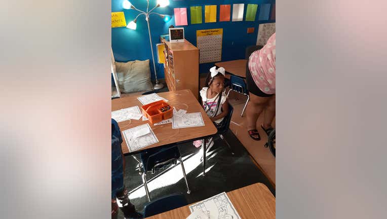 Jayda Holmes returns to school