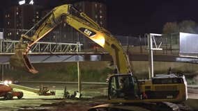 MnDOT crews 'carefully' demolish pedestrian bridge near Augsburg University