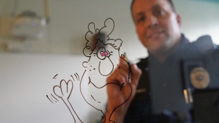 Officer's daily doodles brighten students' days in New Brighton
