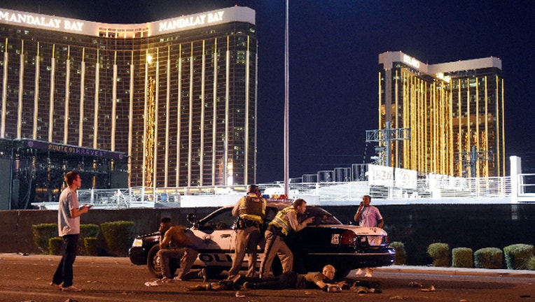 ecb72404-GETTY_Vegas shooting_1536785570323.jpg.jpg