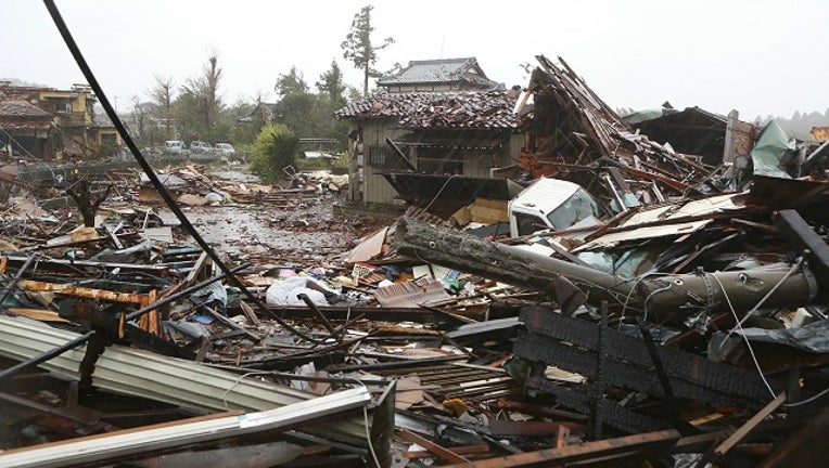 This general view shows damaged homes caused by strong wind brought by Typhoon Hagibis in Ichihara, Chiba prefecture on October 12, 2019.