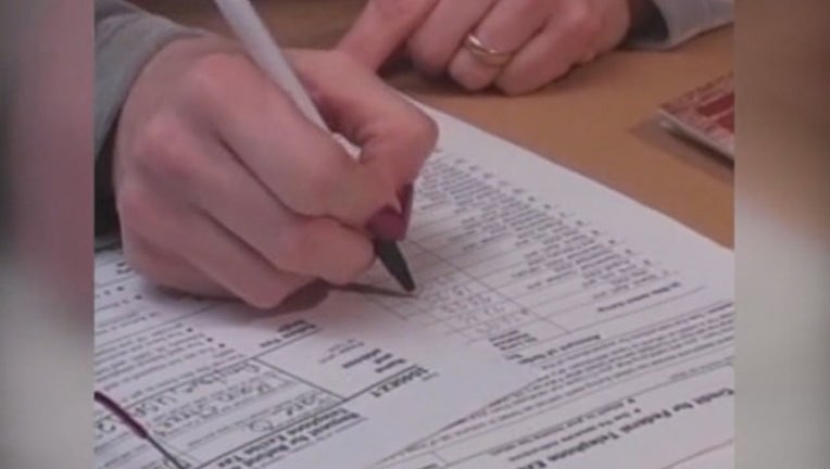 af4c05a3-VO FILE OF TAXES_KMSP5cab_146.mxf_00.00.26.23_1514321333042.png.jpg