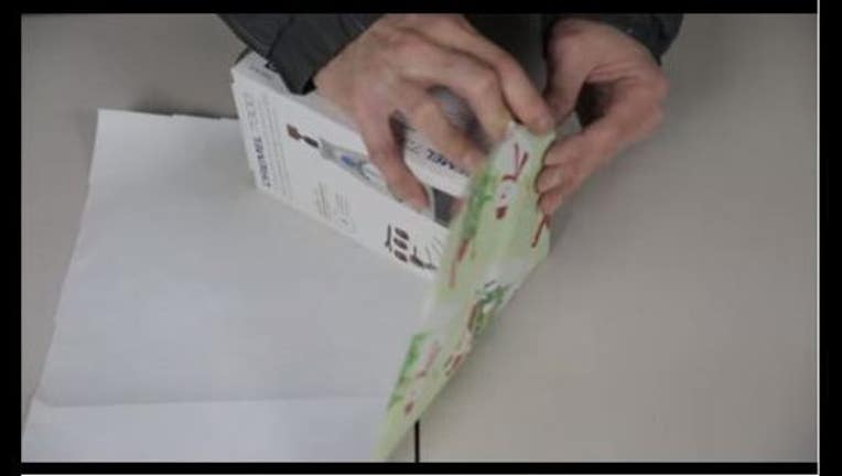 cd6d130e-gift wrapping hack_1450796764526.JPG