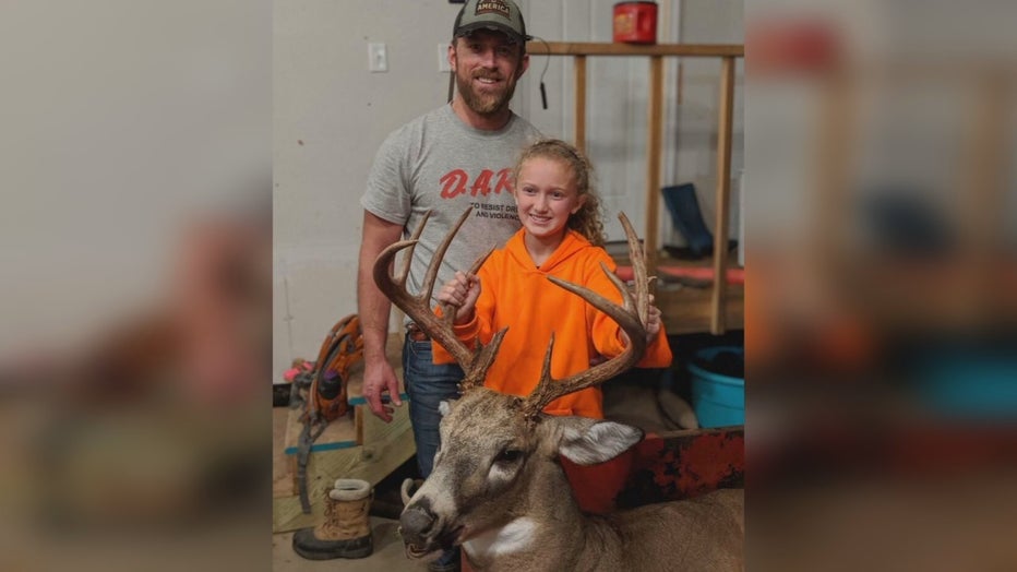 Lilly Mickelson with dad and buck