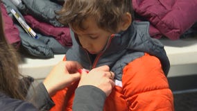 Operation Warm: Minneapolis, Coon Rapids fire departments give hundreds of coats to kids