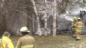 Off-duty volunteer firefighter rescues 2 men from house fire in northeastern Minnesota