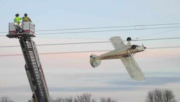 Plane stuck in power line Shakopee