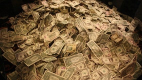 Man robs Colorado bank, throws cash, says ‘Merry Christmas’