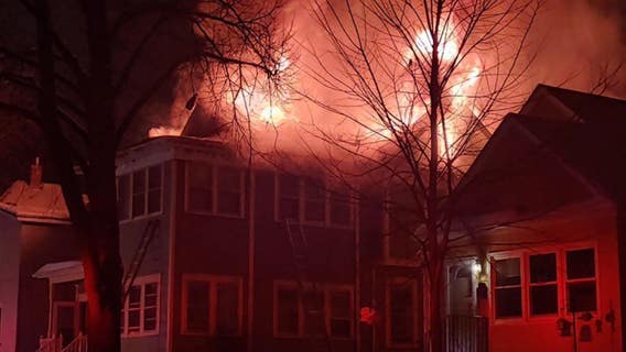 Firefighters search burning St. Paul house, pull out before roof collapse