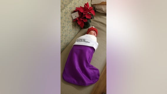 Christmas holiday babies receive presents at Methodist Hospital