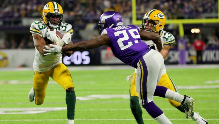 Packers shut down Vikings 23-10 to win NFC North title