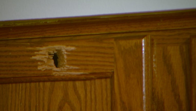 bullet hole Kou Yang home