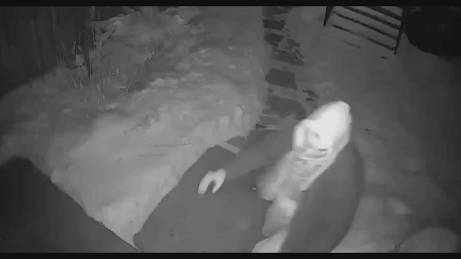 Robber caught on garage camera