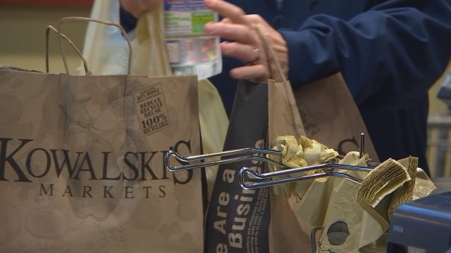 Minnesotans head home early, flock to stores ahead of snowy weather