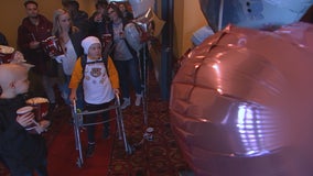 Gophers Football team rallies around girl starting second battle with cancer at special movie party