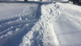 Police remind snowmobile drivers not to ride on sidewalk