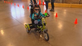 Children with disabilities test out adaptive bicycles with Gillette Children's Hospital