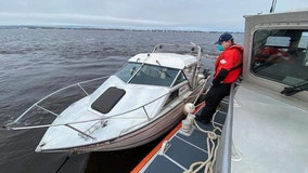 Coast Guard rescues family, dog from boat taking on water near Duluth Aerial Lift Bridge