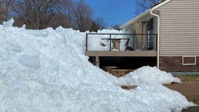 Wind-swept ice piles up on the shores of Mille Lacs