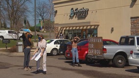 Minnesota Caribou Coffee workers hold car rally to protest working conditions during pandemic