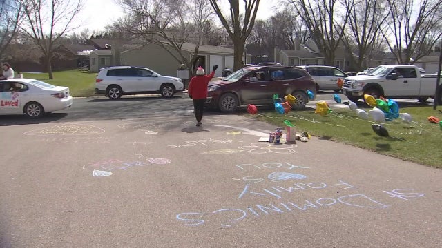 Retiring Minnesota teacher surprised with birthday parade from community