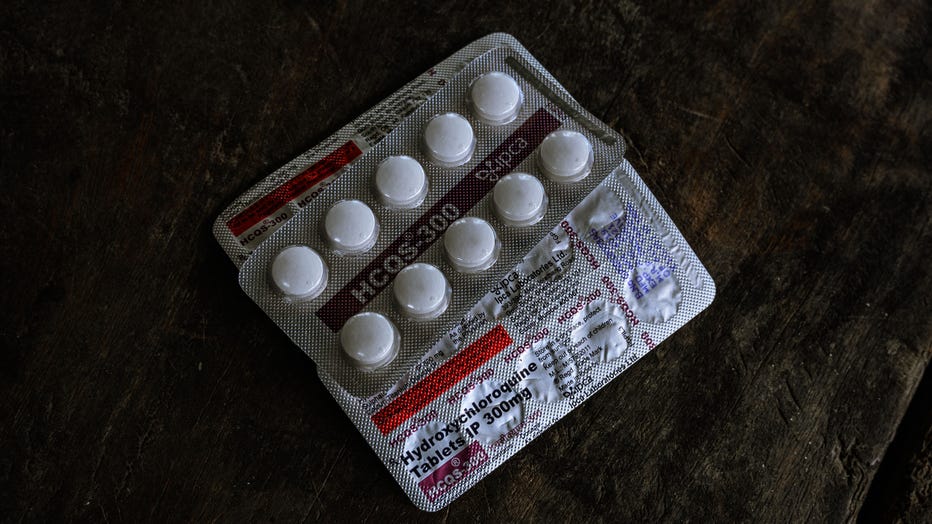 60569e13-Hydroxychloroquine Photo Illustration