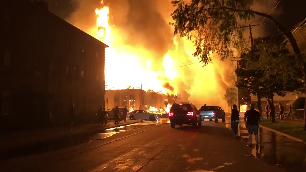 Building burns as riots erupt in Minneapolis