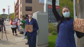 Nurses protest outside United Hospital for use of hospital-issued scrubs