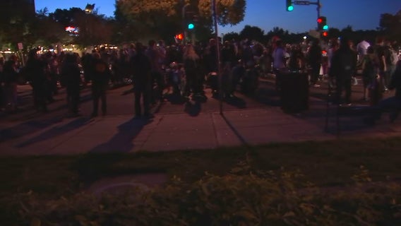 Crowd runs away after St. Paul police fire tear gas at protesters trying to cross bridge into city