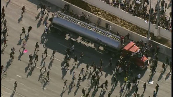 Semi driver who drove onto I-35W bridge during protest charged