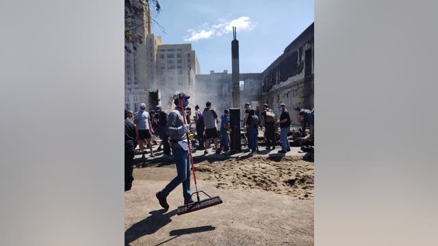 Minneapolis, St. Paul residents clean up after another night of riots, fires