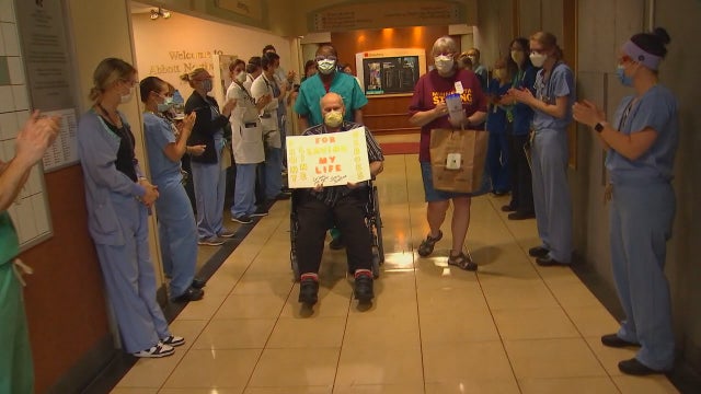 Minnesota man receives applause from hospital staff after recovering from COVID-19