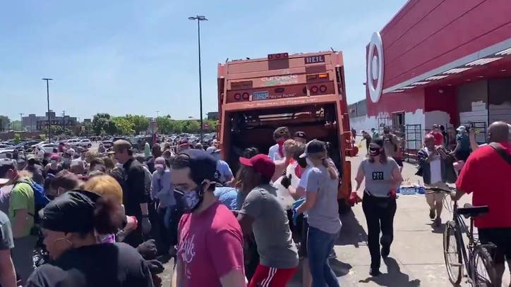 Crowd gathers to clean up Minneapolis Target damaged from looting - FOX 9