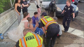 Minnesota bride in wedding dress stops to help injured crash victim