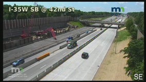 Crane falls over at I-35W construction site onto closed northbound lanes