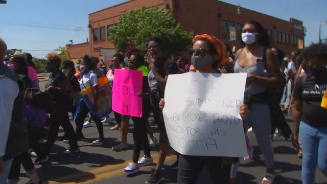'These are our men': Mothers march demanding change in Minneapolis