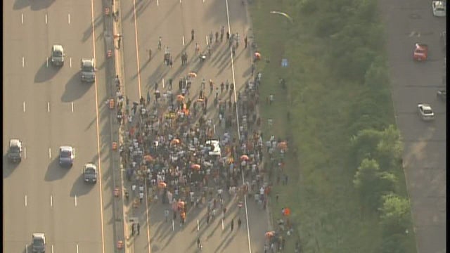 Protesters march onto I-94 in St. Paul in response to unrest in Ethiopia after death of singer