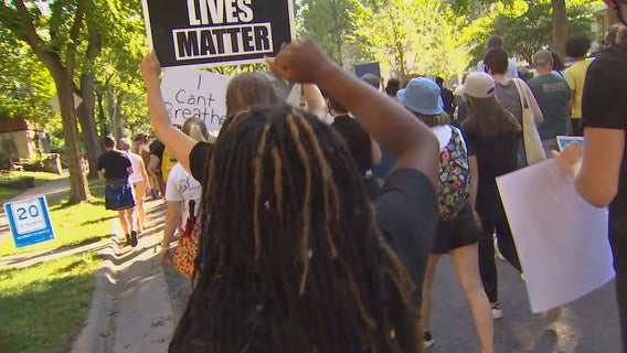 Demonstrators in Minneapolis stand in solidarity with Kenosha
